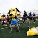 Uto Shiozawa, 4, tries on a yellow dog costume head during the Ann Arbor Marathon on Sunday, June 9. Daniel Brenner I AnnArbor.com